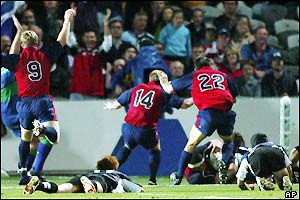 Riaan van Zyl scores a late try for the USA