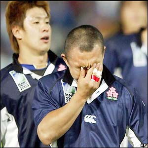 Japan's Takashi Tsuji is disappointed after his side's defeat