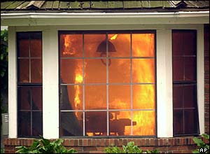 Fire explodes through the living room of a home in San Diego, southern California.