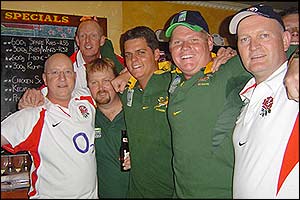 England and South Africa fans watch the game between the two countries