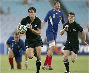 Mils Muliaina of New Zealand goes on a break