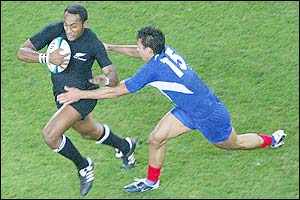 Joe Rokocoko takes on the France defence