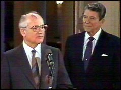 Mickail Gorbachev and Ronald Reagan at the signing ceremony