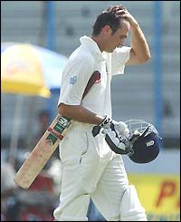 England captain Michael Vaughan walks off after being dismissed by Mashrafe Mortaza