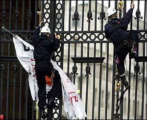 Police taking down a banner at Admiralty Arch