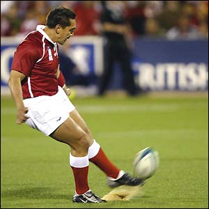 Pierre Hola kicks a conversion for Tonga