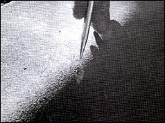 The bullet-scarred kerb. Picture courtesy of James Tague. Photographer: Tom Dillard