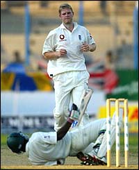 Matthew Hoggard floors Rajin Saleh with a short-pitched delivery