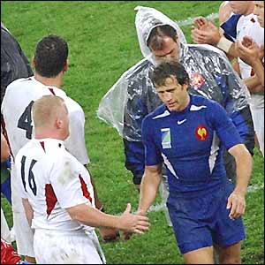 France captain Fabien Galthie (right) shakes hands with England players as he leaves the field in his last match