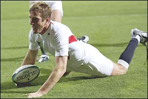 Will Greenwood scores England's only try of the match in the win over South Africa