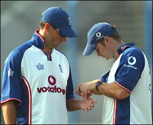 England opener Marcus Trescothick has his sprained thumb attended to by physio Kirk Russell