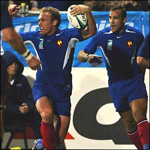 France centre Brian Liebenberg celebrates scoring France's first try
