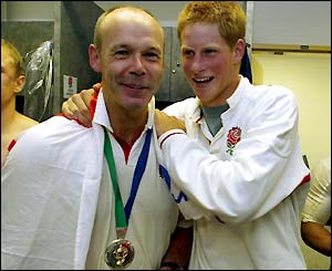 Prince Harry congratulates England coach Clive Woodward on victory