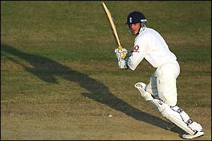 England wicket-keeper Chris Read hits the ball into the covers