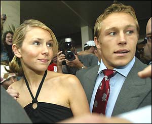 Jonny Wilkinson (right) and his girlfriend Di Stewart leave the England team hotel