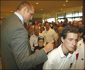 Ben Kay signs an England fan's shirt