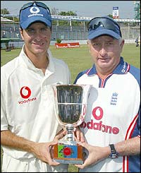 England captain Michael Vaughan and coach Duncan Fletcher proudly display the trophy 