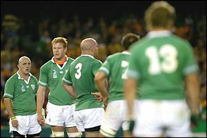A dejected Ireland team realise they have lost the match