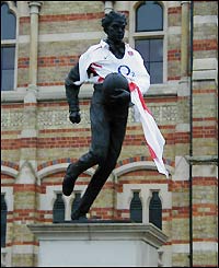 William Webb Ellis statue outside Rugby School