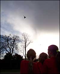 Schoolchildren in Bristol watch the final flight of Concorde, as photographed by a BBCi user