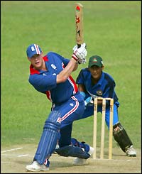 England's Andrew Flintoff hits a four