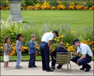 Police talk to man in park
