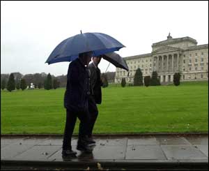 Members of the public stroll outside the empty Parliament Buildings on Friday