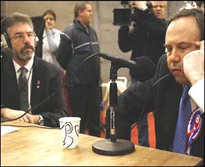 Sinn Fein's Gerry Adams and the DUP's Nigel Dodds take part in a radio interview at the Belfast count