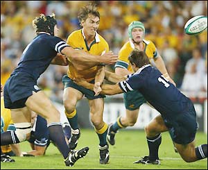 Mat Rogers makes a mistake to stop his side scoring