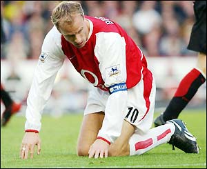 Dennis Bergkamp misses his shot