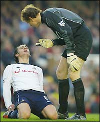 Arsenal keeper Jens Lehmann has words with Spurs' Helder Postiga
