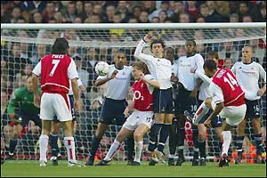 Thierry Henry's free-kick is incehs over the bar