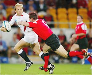 Scrum-half Matt Dawson makes an early break