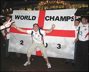 Steven Raynor is pictured against a backdrop of the St George flag
