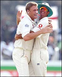 Andrew Flintoff is congratulated by Michael Vaughan on dismissing Marvan Atapattu