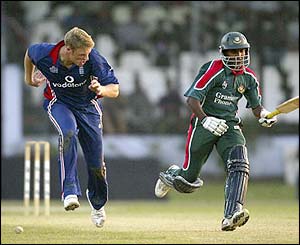 Khaled Mashud scampers through for a quick single