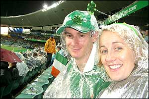 Irish supporters in the rain during Ireland's game against Namibia