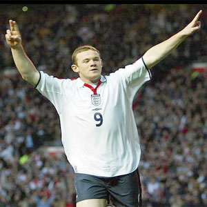 Wayne Rooney celebrates scoring his third international goal