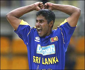 Chaminda Vaas celebrates the wicket of Marcus Trescothick