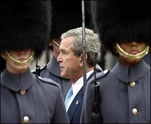 President Bush carries out an inspection of the guards