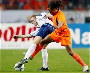 Holland's Edgar Davids battles with Scotland's Darren Fletcher