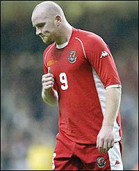 Wales' John Hartson is disappointed after the match