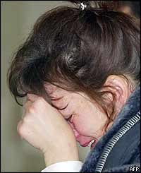 A female relative of one of the victims of the cries at a local hospital in Yessentuki