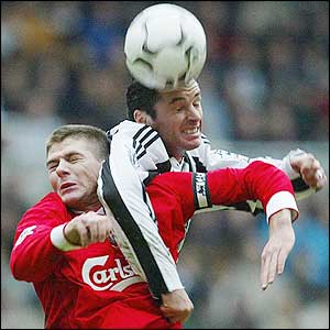 Liverpool's Steven Gerrard and Newcastle United's Gary Speed clash 
