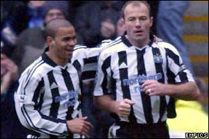 Newcastle's Alan Shearer celebrates scoring with Kieron Dyer