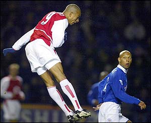 Arsenal's Gilberto Silva heads the opening goal