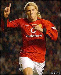 Substitute Diego Forlan celebrates
