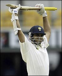 India's Sourav Ganguly celebrates reaching his century