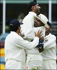 Harbhajan Singh grabs the wicket of Matthew Hayden