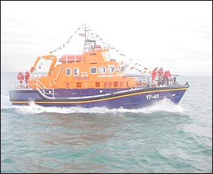 The RNLB Christopher Pearce pulls alongside the RNLB Kenneth Thelwall. Although delighted with the new vessel some crew expressed their sadness at the departure of the old boat 